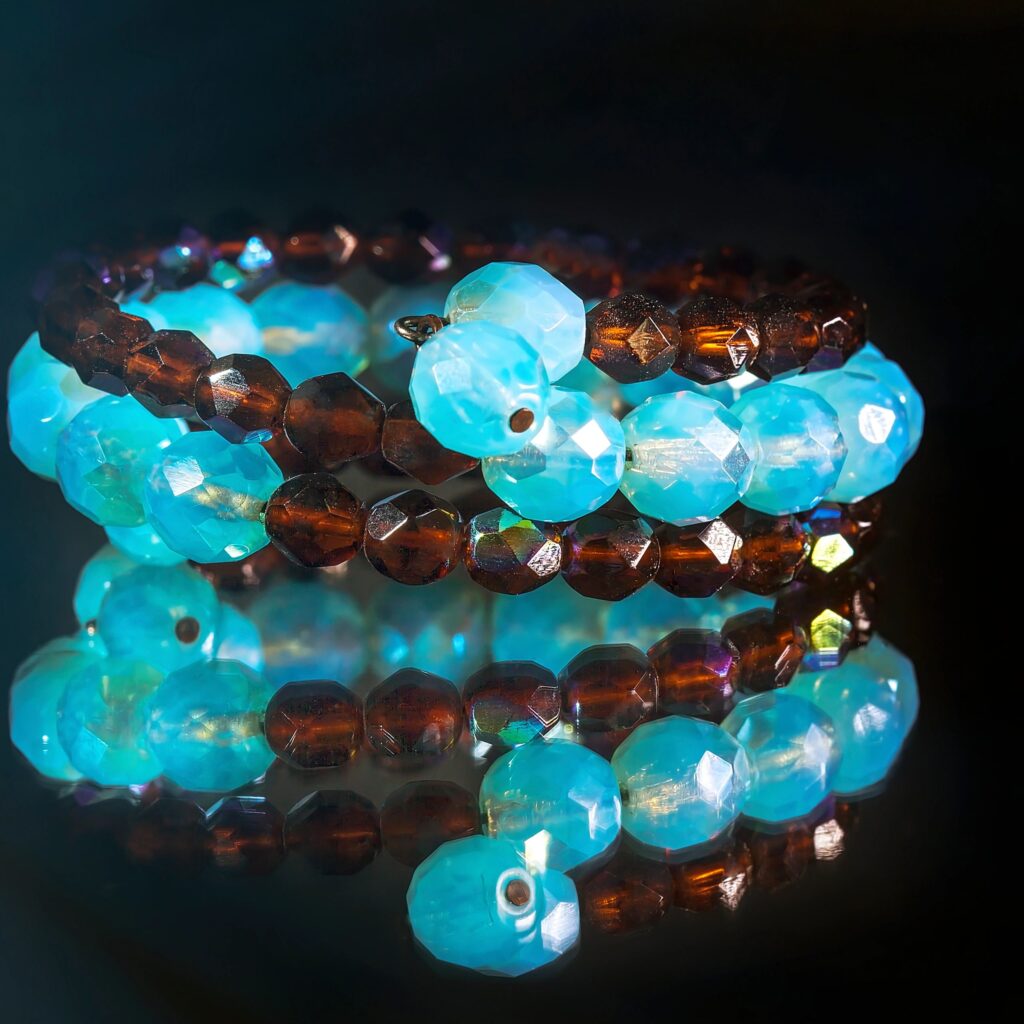 Handmade beaded bracelet set on a neutral studio background