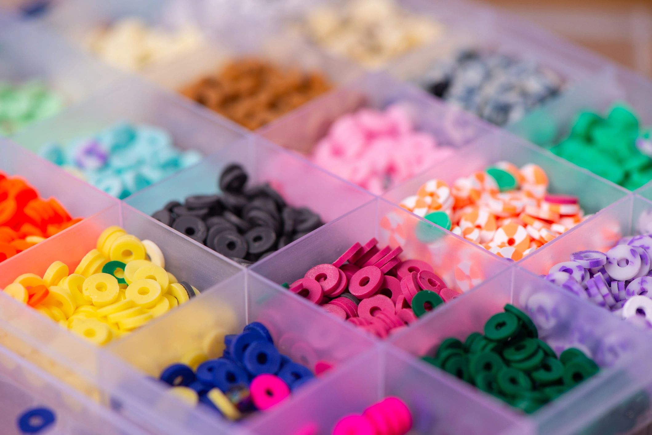 Colourful beads organized for jewellery making