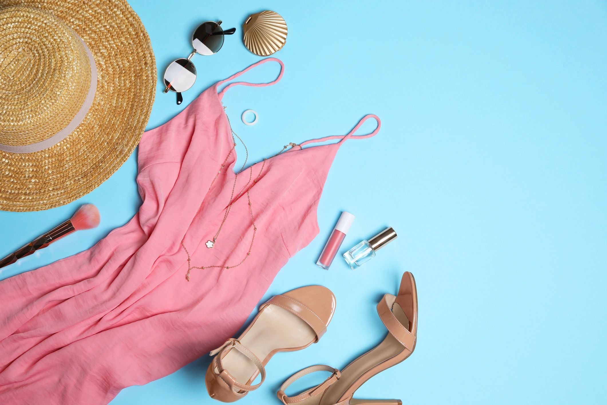 Flat lay of women’s clothing and accessories for Fashion wear by A Colors Studio