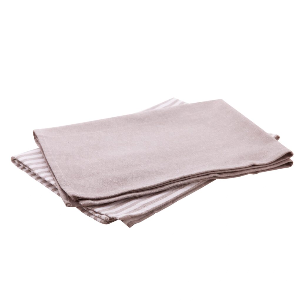 Women’s cotton short top (pastel) folded, studio-style on white background